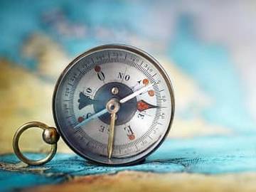 compass on multicolored background
